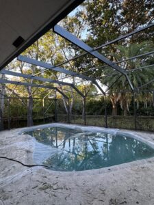 Pool enclosure repainting service in Coral Springs